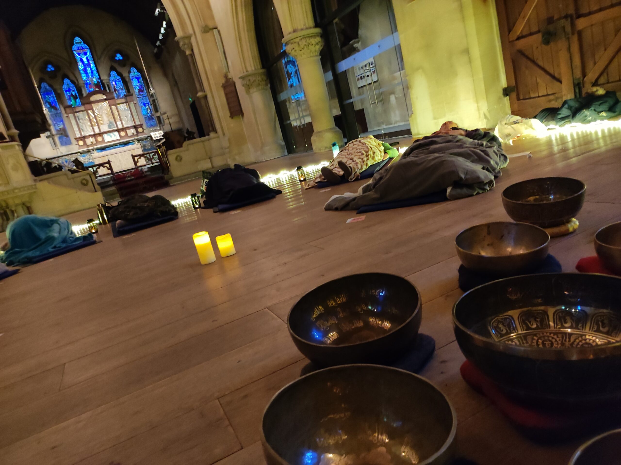 people relaxing in soundbath